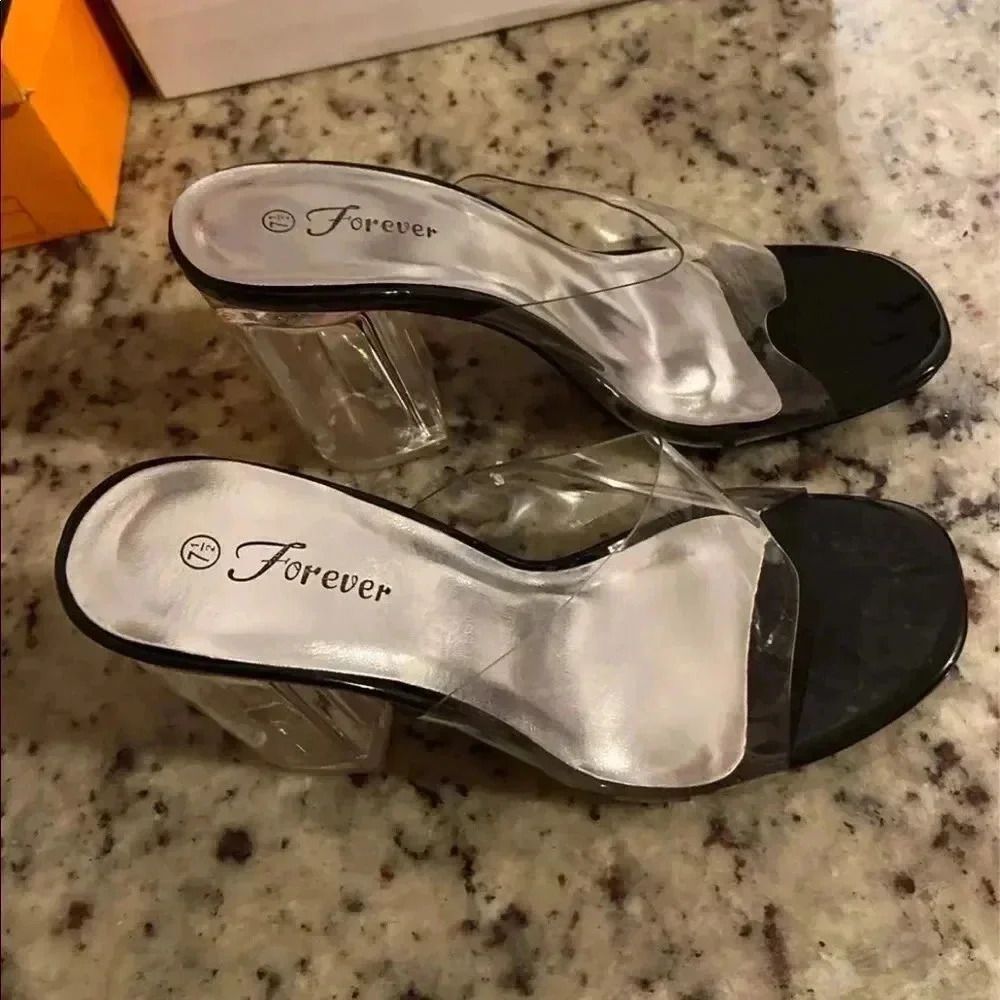 Clear sexy platform heels. Brand new, never worn! Heel height 3.5 inches